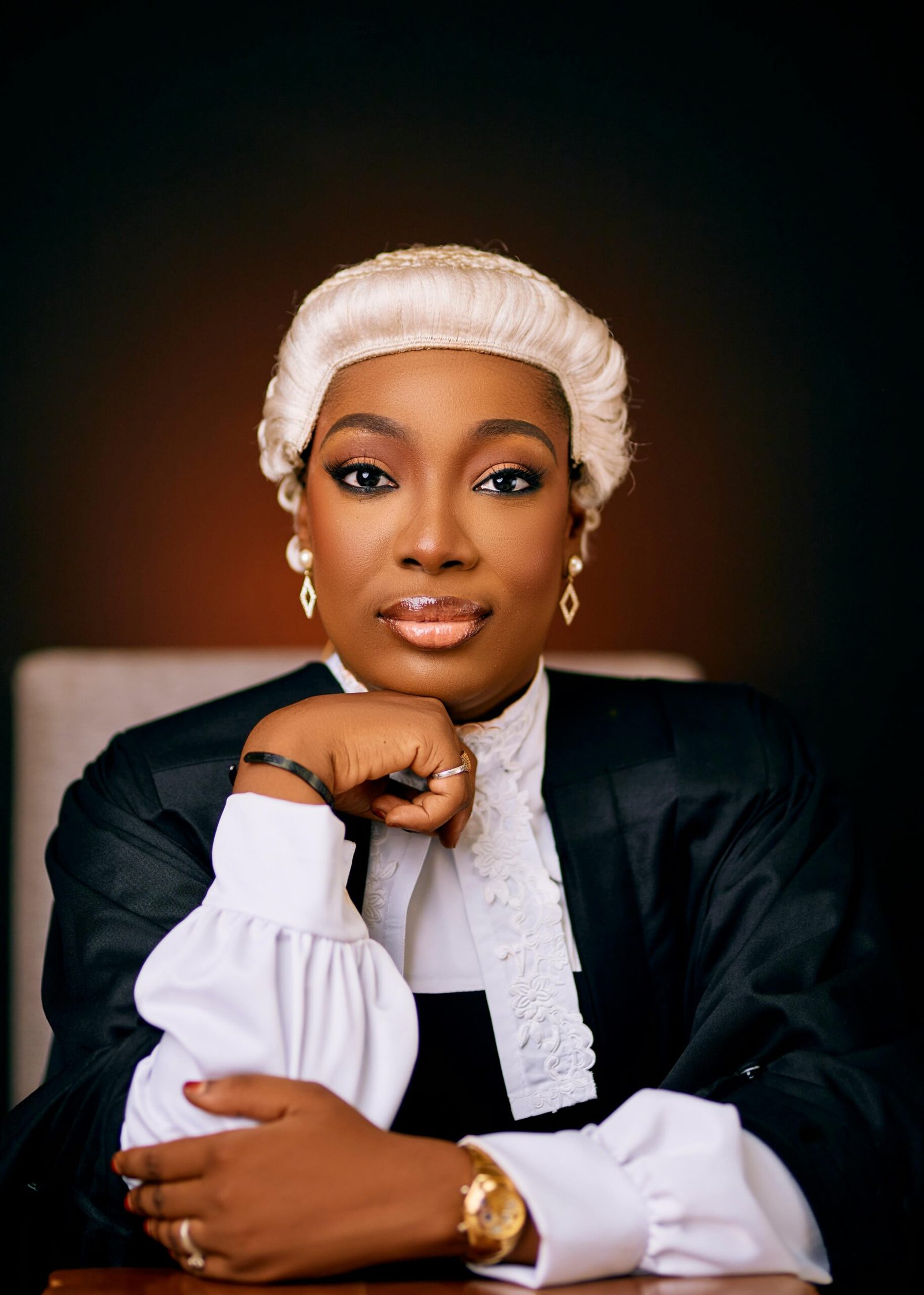 Portrait of a female lawyer in formal legal attire showcasing professionalism and confidence.